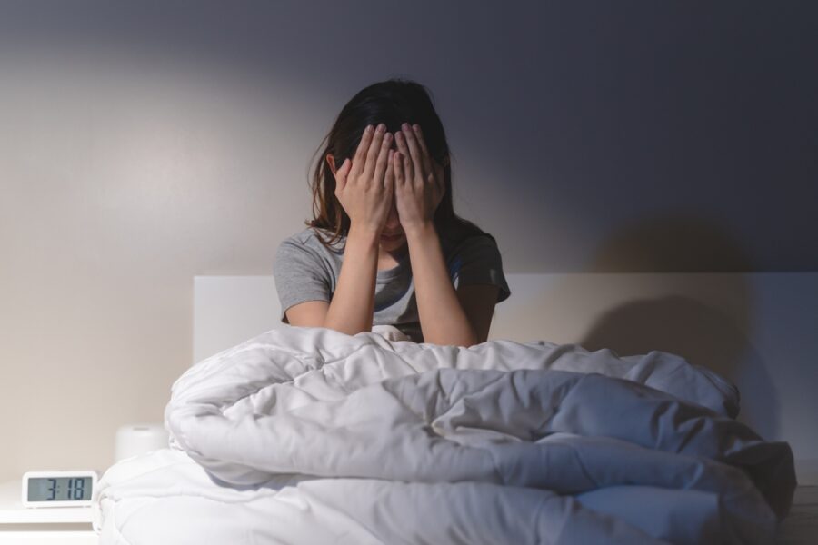 Healthy foods and unhealthy snacks illustrating how diet affects insomnia and sleep quality