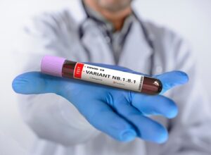Doctor reviewing lp(a) blood test results to detect hidden genetic risk for heart disease