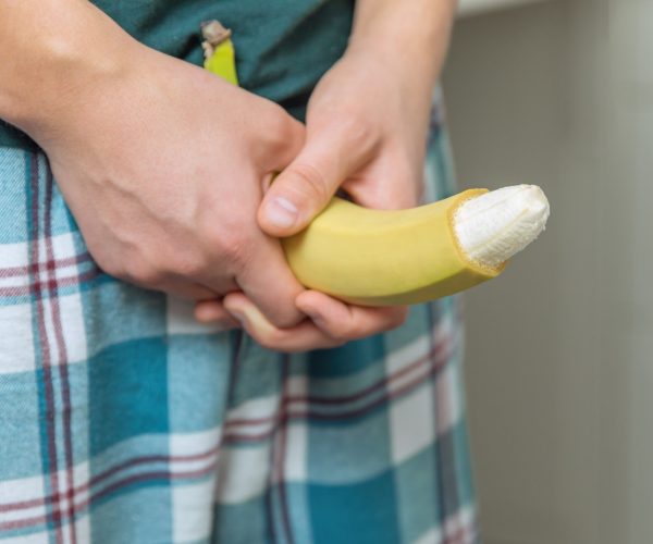 Hand,Of,A,Young,Man,With,A,Banana,With,The