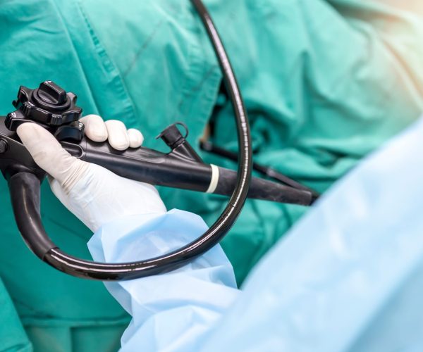 A,Doctor,Or,Surgeon,In,A,Light,Blue,Protective,Gown