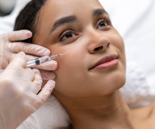 Young,Dark-skinned,Woman,Having,A,Session,Of,Mesotherapy