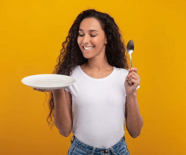 Portrait,Of,Excited,Hungry,Young,Lady,Holding,Spoon,And,Showing